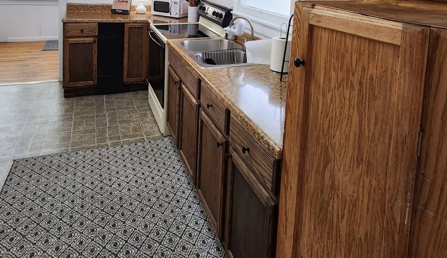 SPACIOUS HOUSE ON 3RD. THREE BEDROOMS TWO BATHS. WASHER DRYER. LARGE YARD