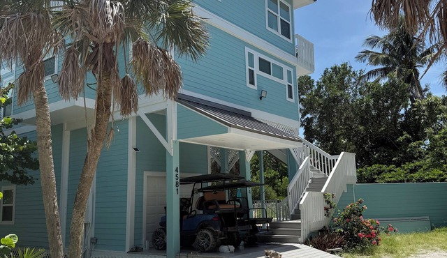 Spacious island getaway with a big pool just steps from the beach!