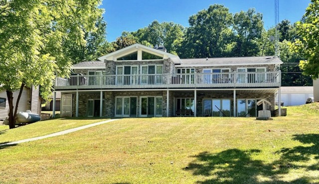 Spacious Lake house with Double Boat Dock & Gently Sloping Lot