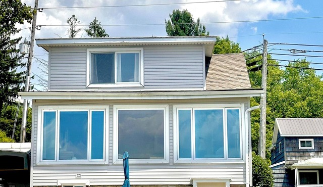 Spacious lakefront home with private dock and a panoramic view of Conneaut Lake.