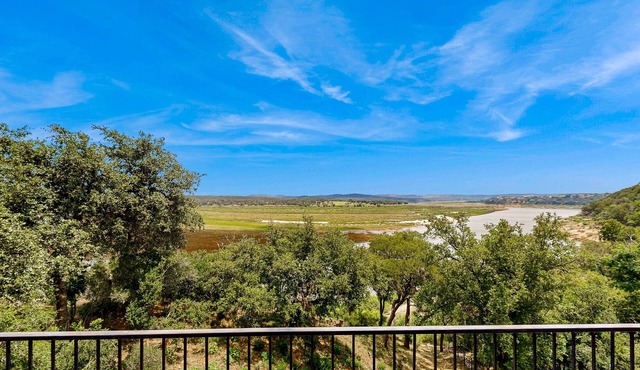 Spacious lakefront hideaway with decks, grill, billiards, tennis & pool