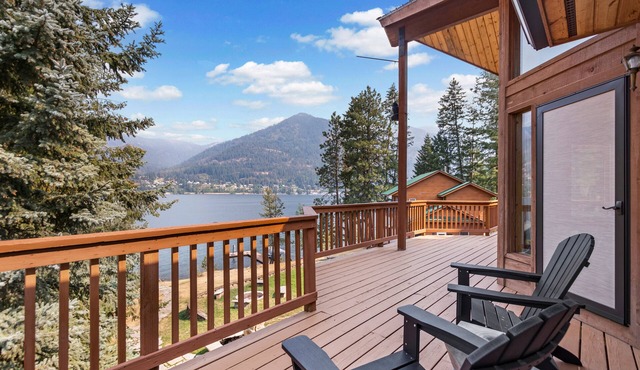 Spacious lakefront home with private hot tub, dock, boat lift, views & game room