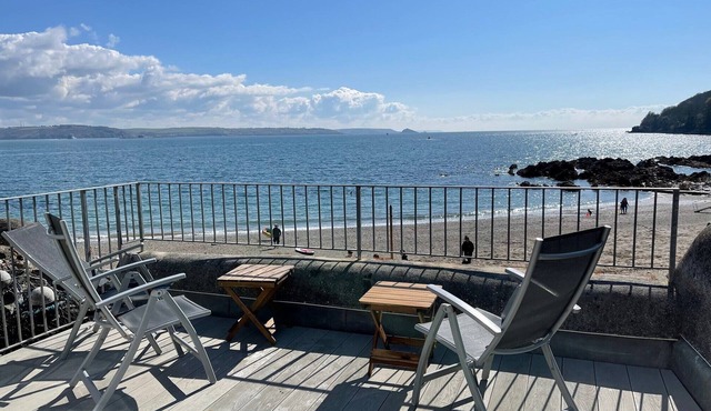 Spacious light cosy beach front house with balcony overlooking the sea