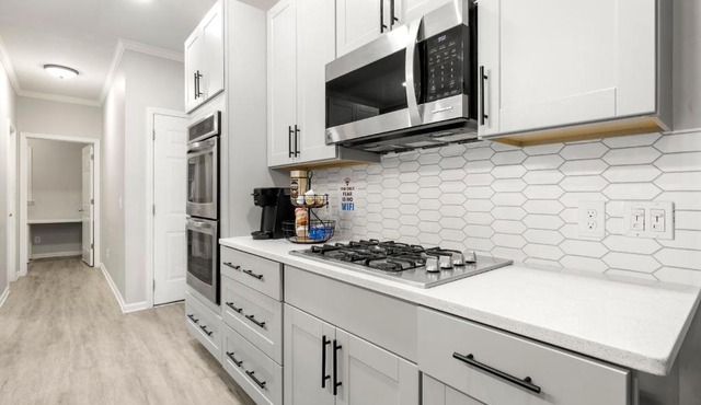 Spacious lovely 5 bedroom home with alot of amenities, prime location, home theater, pet&longstay ok