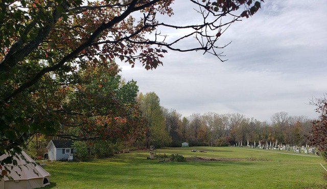 Spacious luxury tent in quiet country setting.