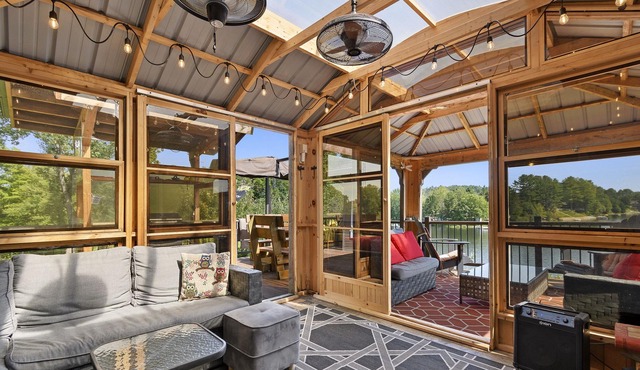 Spacious modern waterfront cottage with private beachfront