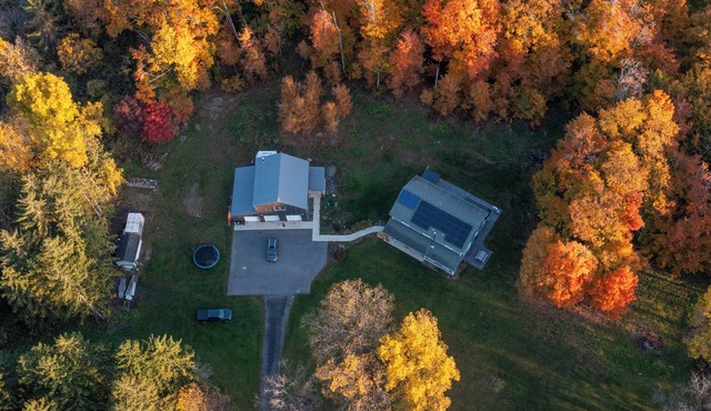 Spacious, modern 4-BR house in serene wooded setting just minutes from downtown