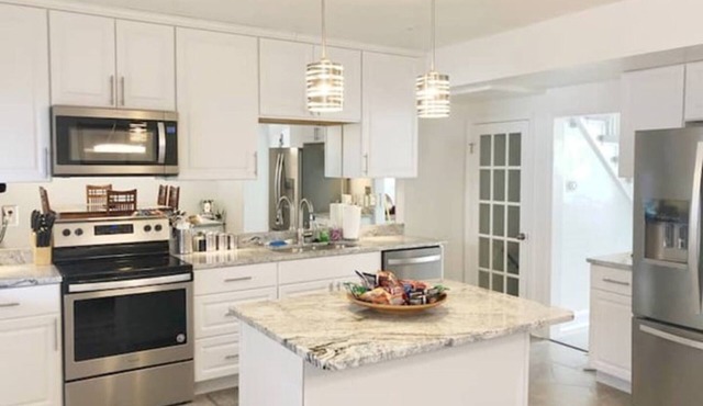 Spacious, Modern, Three Bedroom Townhome with Private Backyard