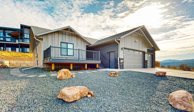 Spacious mountain view home with gas fireplace, game room & heated 4 car garage