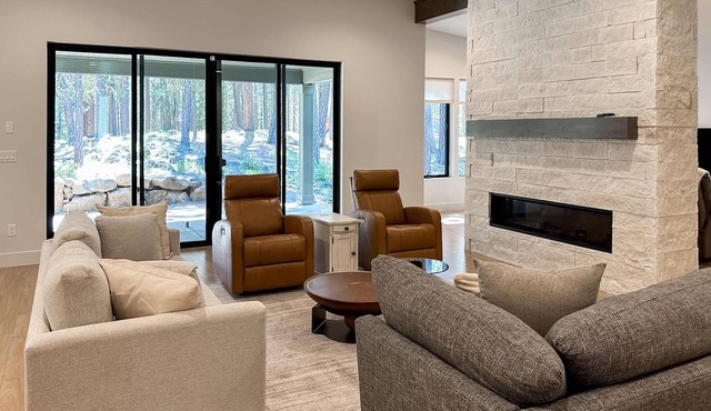 Spacious new construction home with forest views and resort amenities