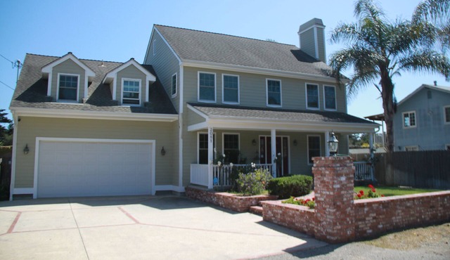 Spacious newer home within walking distance of secluded beaches and polo fields.