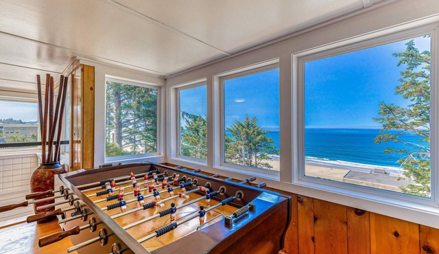Spacious ocean view home with wood fireplace, grill, & deck - dog-friendly
