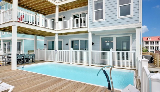 Spacious oceanfront 7-bedroom home on Oak Island, perfect for large gatherings.