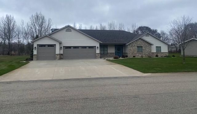 Spacious one-level family friendly, tranquil backyard with boat access.