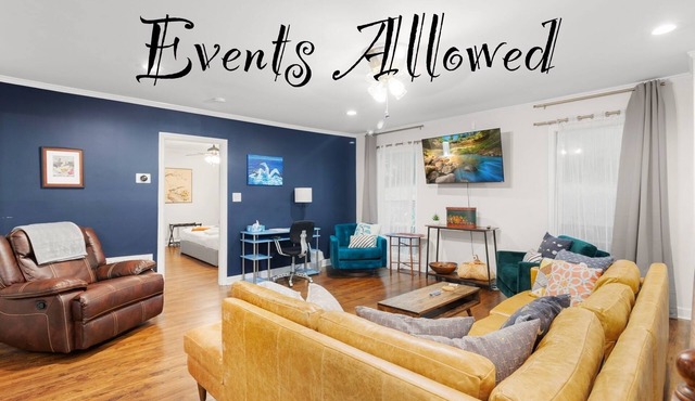 Spacious open floor plan. 5 beds. 5 TVs. & Art.