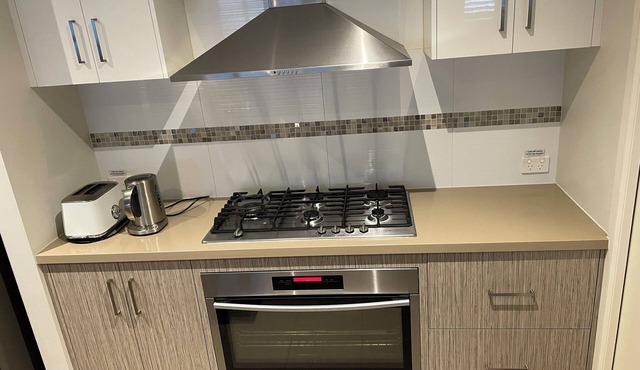 Spacious Queen Bedroom in Tranquil Oasis