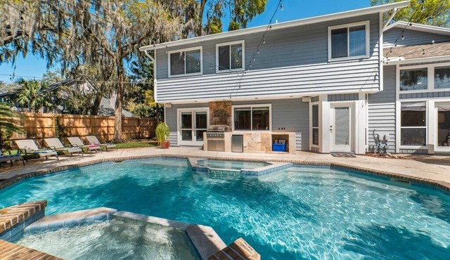 Spacious retreat just minutes from the beach with a stunning pool and game rooms