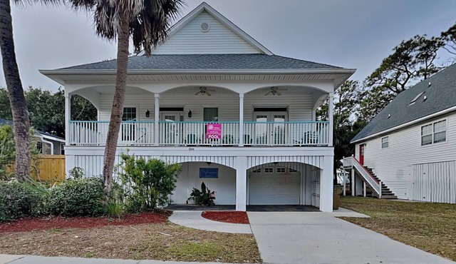 Spacious retreat located one block from the beach + private pool!