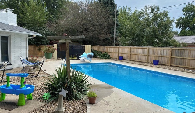 Spacious Retreat: Sleeps 16 with pool, hot tub, Game Room, and Fitness Room
