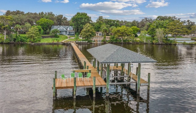 Spacious riverfront home perfect for larger families, featuring stunning river views, private dock