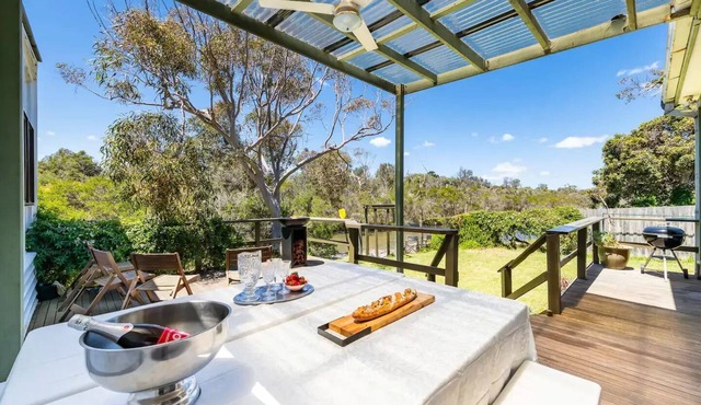 Spacious riverfront beach house getaway