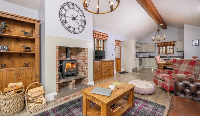 Spacious riverside lodge with mountain views.