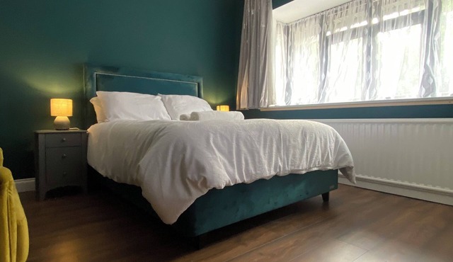 Spacious self-contained 2-bed apartment with a fully equipped kitchen dinner.