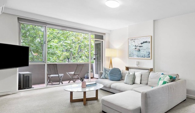 Spacious South Yarra apartment with pool and private car park.