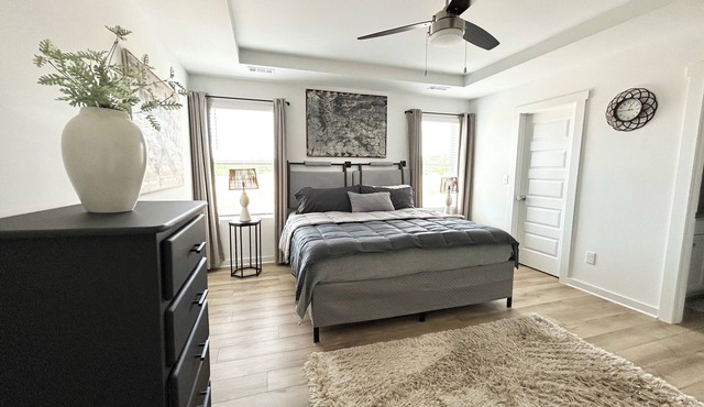 Spacious Stay with 2-Car Garage & Multiple TVs