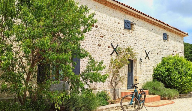 Spacious Stone House with Shared Pool, Babyfoot, and Nature Trails in Bucolic Setting