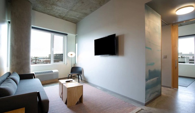 Spacious Suite with Stunning Market Views, Chic Decor, and Modern Amenities