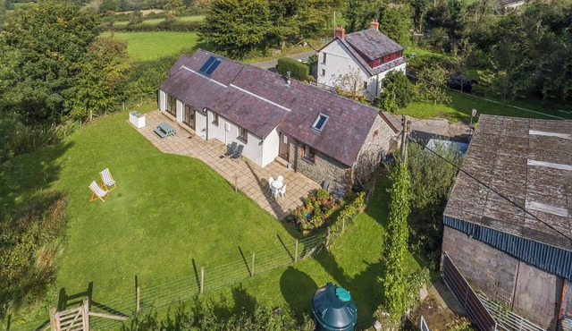 Spacious Teifi Valley barn for holidays near the Cardigan coast.