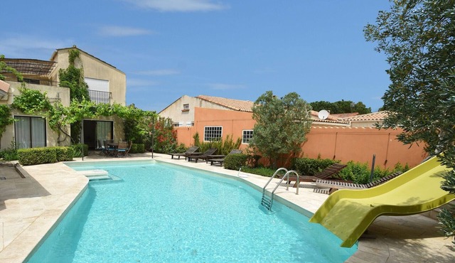 Spacious villa with heated pool with super slide between the beach and lake