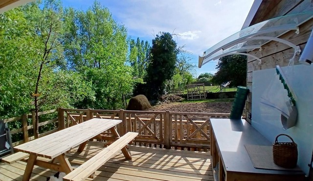 Spacious Wooden Chalet with Terrace and Play Area