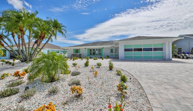 Spacious waterfront home in Apollo Beach w/private swimming pool and boat dock.