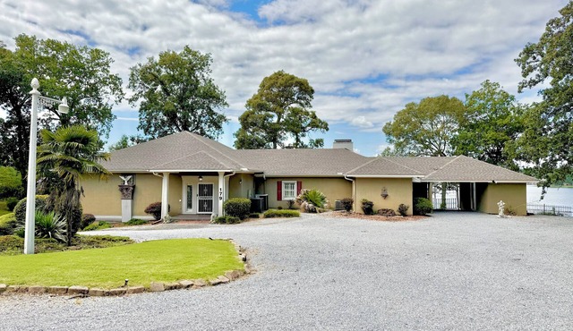 Spacious Waterfront House with a private dock on beautiful Lake Jordan.