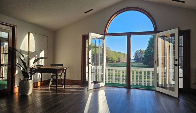 Spacious Waterfront Home secluded on 60 ac with Beach and Boat Ramp