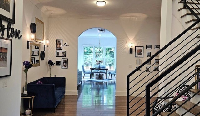 Spaciously inviting 8-bedroom w/en suites, 2 kitchens, fitness room, theater