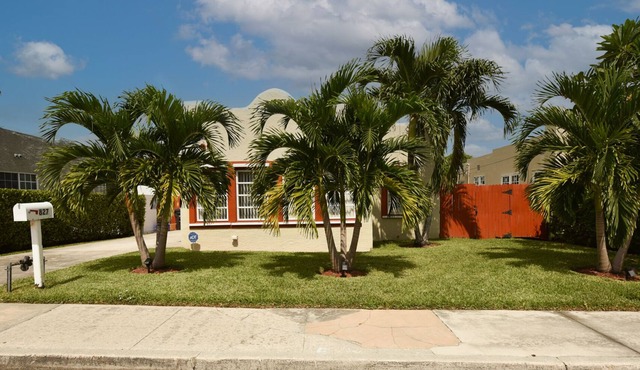 Spanish Style 2/1 situated in the heart of south east west palm beach .