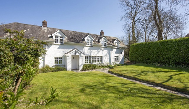 Sparnal Stitch nestled within the trees, just moments from sandy beaches