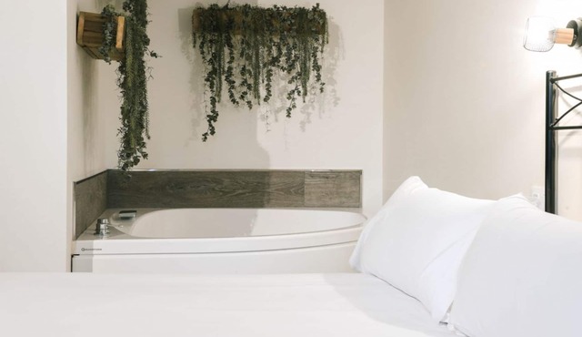 Special studio for couples with double whirlpool tub and balcony.