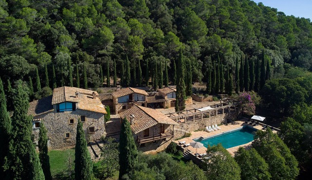Spectacular 17th century Catalan farmhouse surrounded by woods and fields.