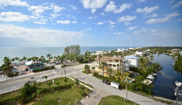 Spectacular 9th Floor Views and Sunsets! Steps to the beach. Free in suite WiFi.