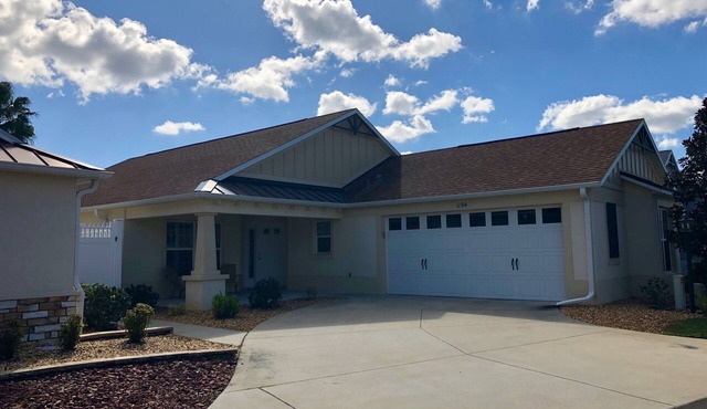 Spectacular Home with a Gas Golf Cart & Located just off Lake Sumter Landing!