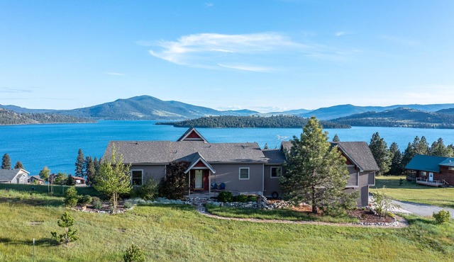 Spectacular lake-view retreat with deck, grill, free WiFi, W/D, & island views