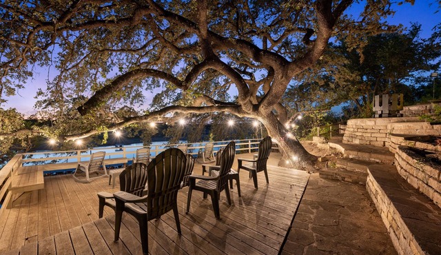 SPECTACULAR LAKEFRONT OASISnOver 400 feet frontage on 2 acres of century oaks