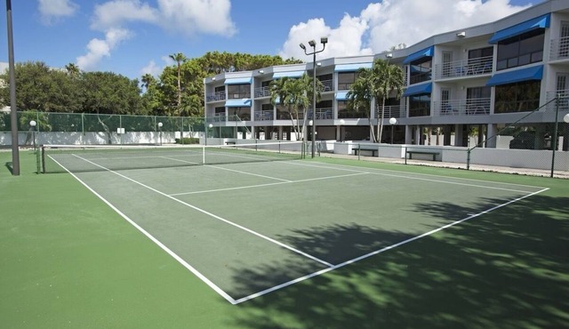Spectacular penthouse on white sandy Longboat Key beach with incredible views.