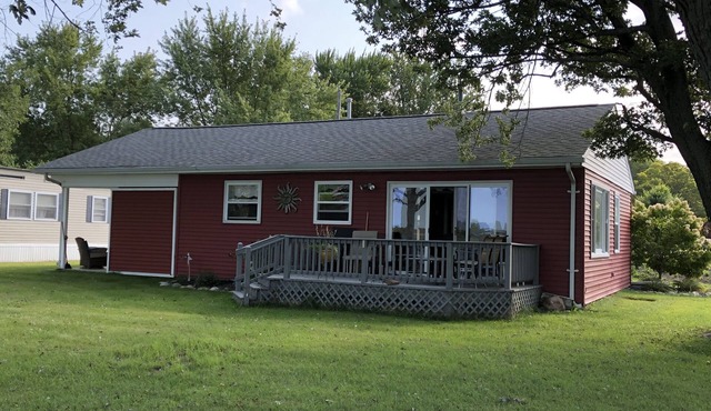 Spectacular sunset views and north chain lake front red cottage rental