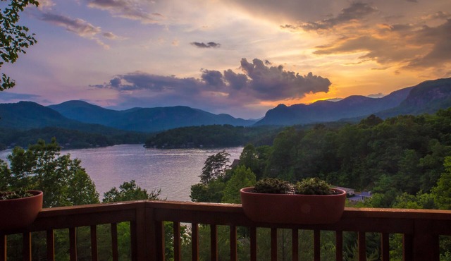 Spectacular views from modern lake front home with boathouse & pontoon available
