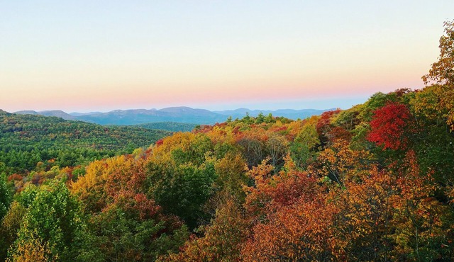 Spectacular views of the Blue Valley, steps from the Rabun Bald trailhead!